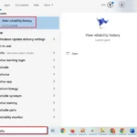 Cách mở Windows Reliability Monitor bằng cách gõ 'reliability' vào thanh tìm kiếm Start Menu trên Windows.