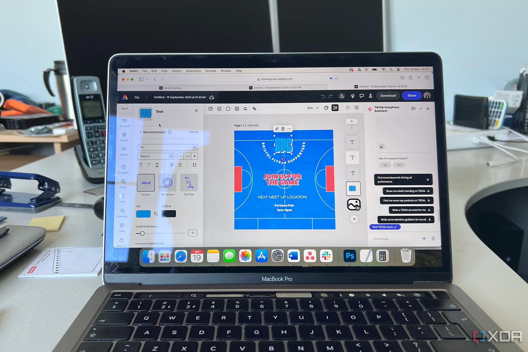 Adobe Express Teams hiển thị trên màn hình MacBook Pro trong môi trường văn phòng, minh họa tính năng làm việc nhóm