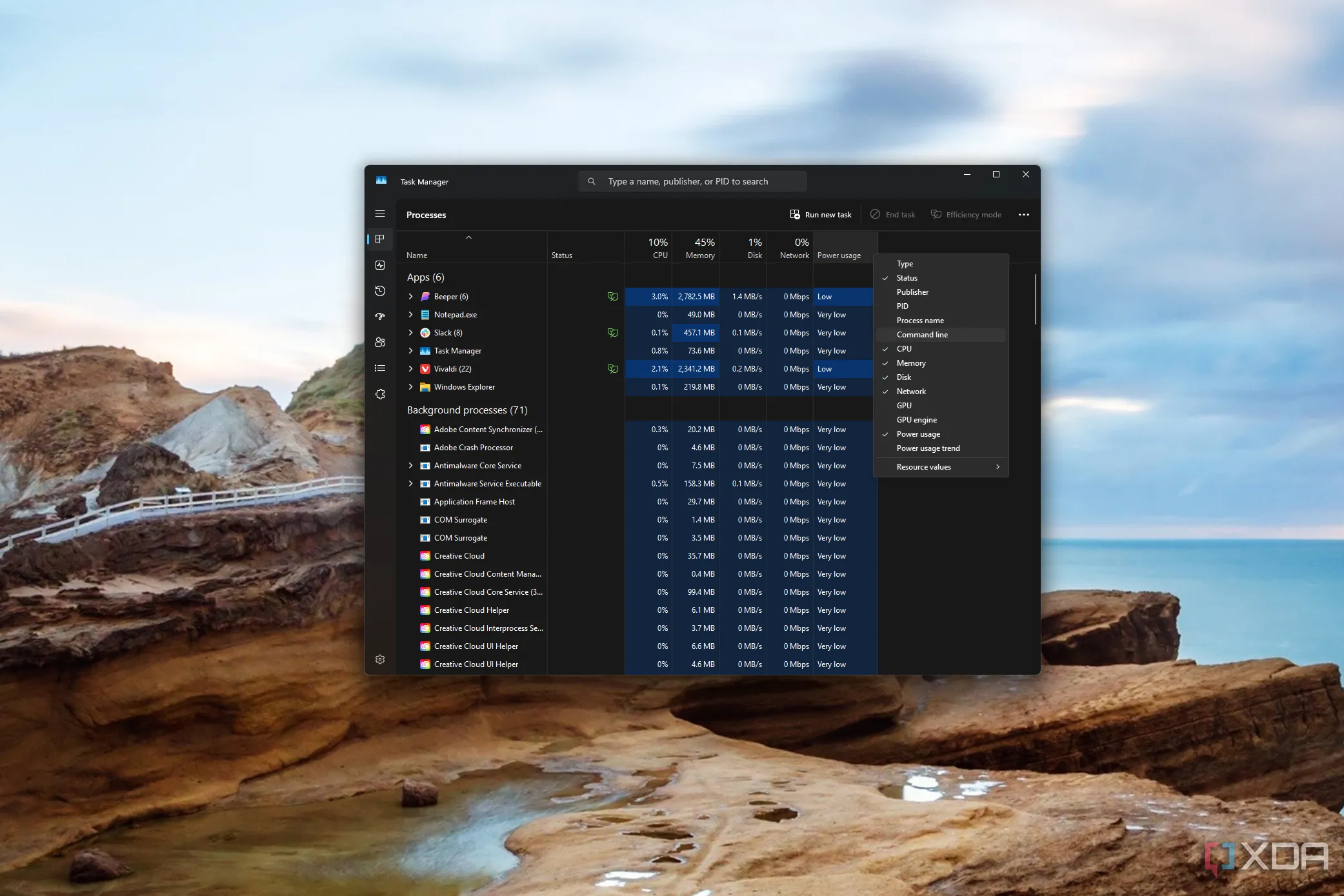 Ảnh chụp màn hình tab Processes của Task Manager hiển thị menu ngữ cảnh với các tùy chọn thêm cột thông tin