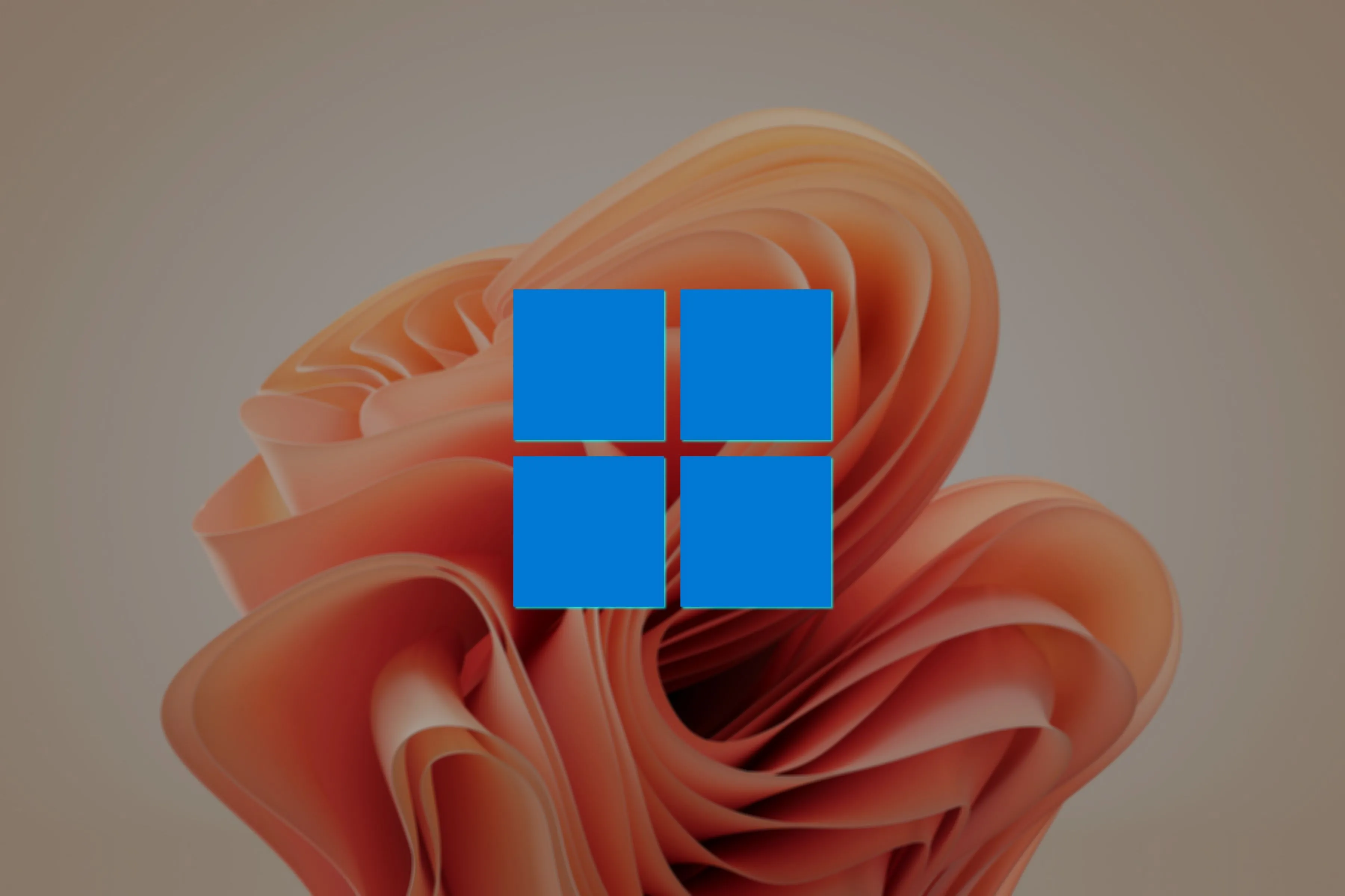 Logo Windows 11 và hình nền Bloom, tượng trưng cho việc lựa chọn phiên bản Windows phù hợp và quản lý bản quyền khi tạo ISO.