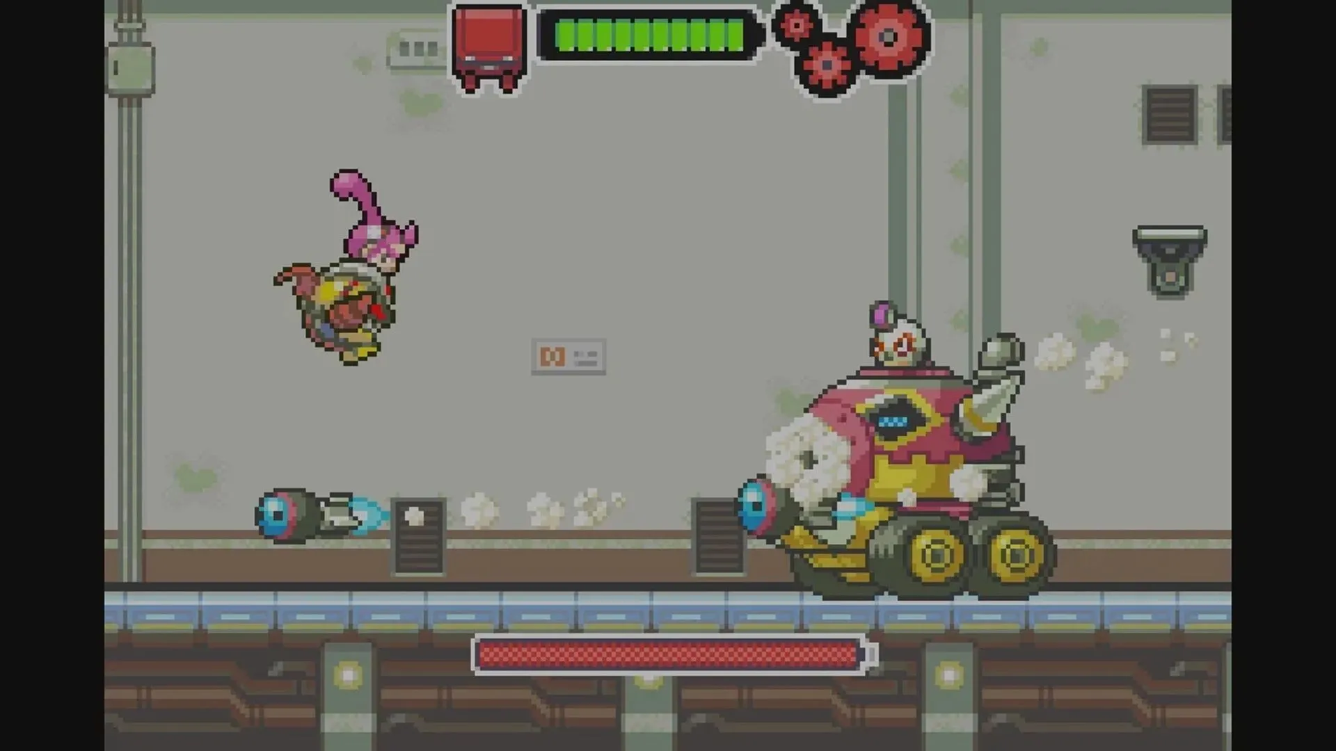 Ảnh chụp màn hình game Drill Dozer trên GBA, nhân vật Jill điều khiển Drill Dozer chiến đấu