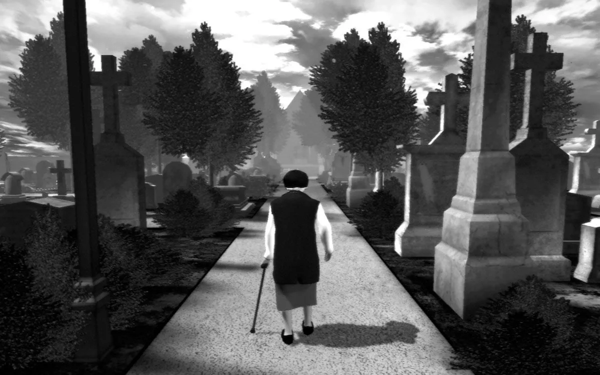 Ảnh chụp màn hình game The Graveyard với hình ảnh một cụ bà đơn độc đi giữa những ngôi mộ trong nghĩa địa.