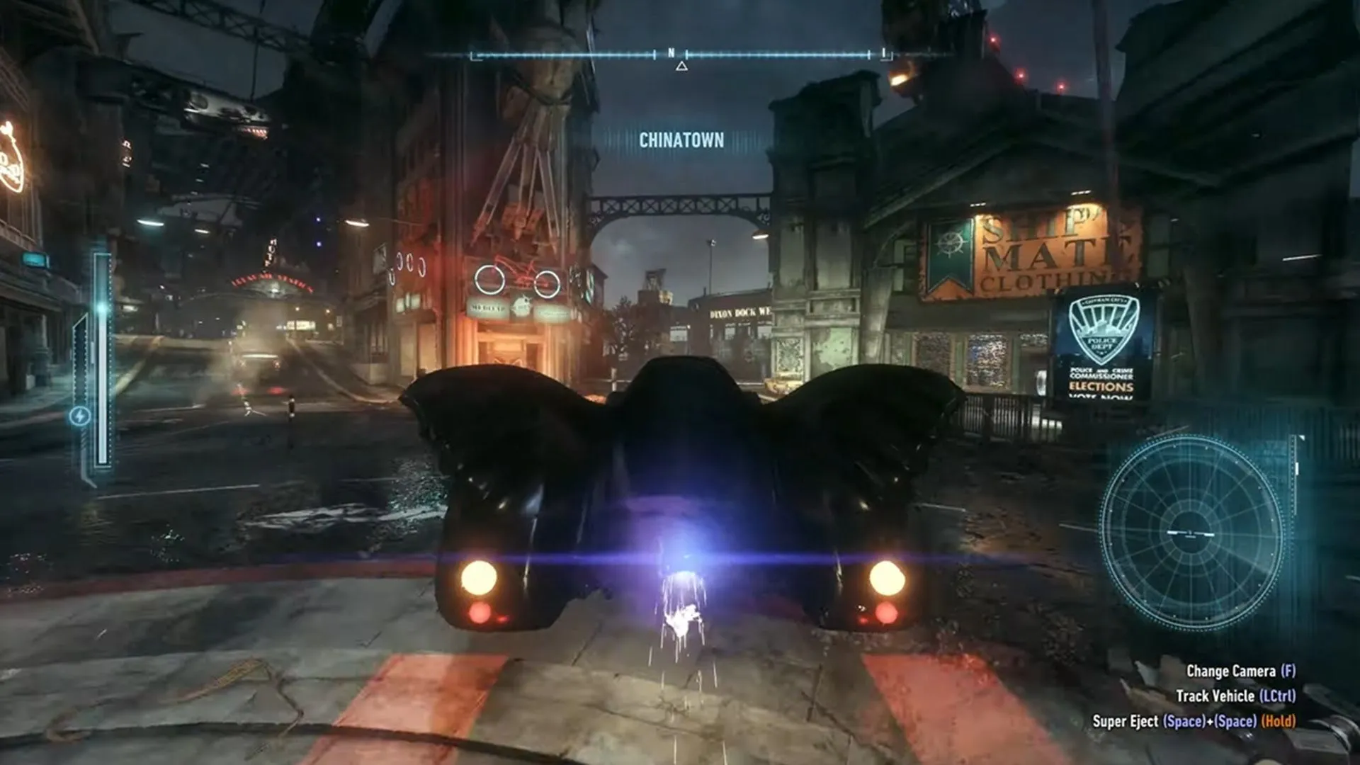 Batman gliding trên không trung thành phố Gotham, biểu tượng cho khả năng di chuyển linh hoạt trong Arkham Knight