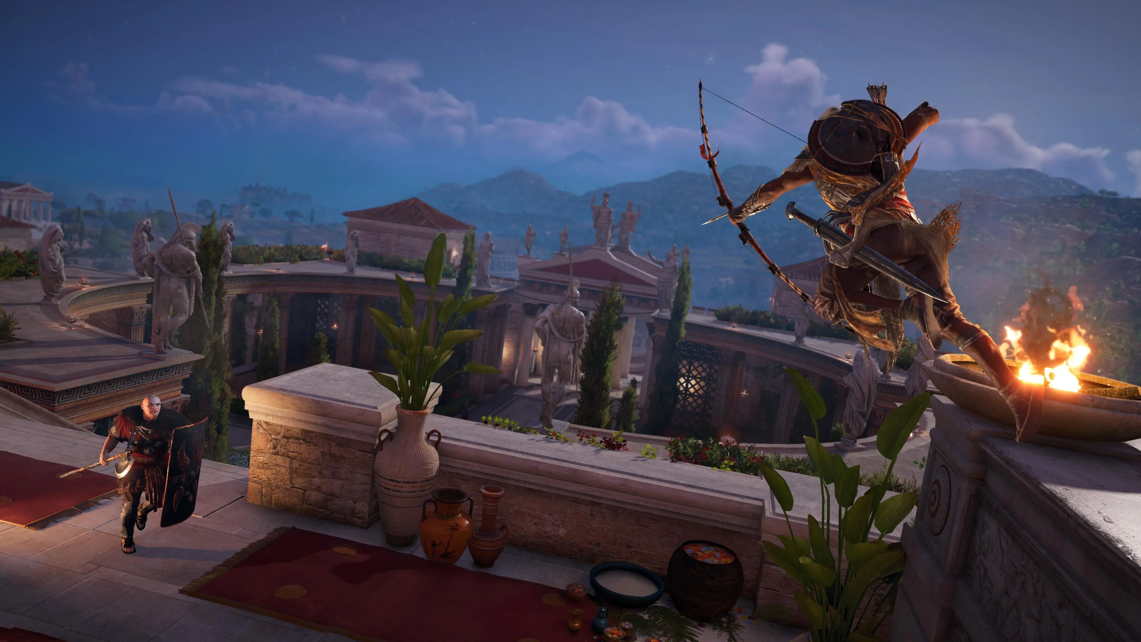 Bayek, nhân vật chính của Assassin's Creed Origins, nhảy từ vách đá và nhắm bắn cung, minh họa lối chơi hành động