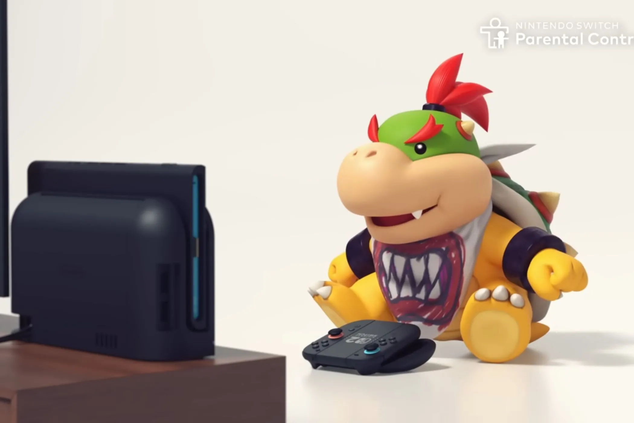 Bowser Jr. chơi Nintendo Switch 2, minh họa chủ đề về trẻ em và kiểm soát của phụ huynh khi sử dụng camera.