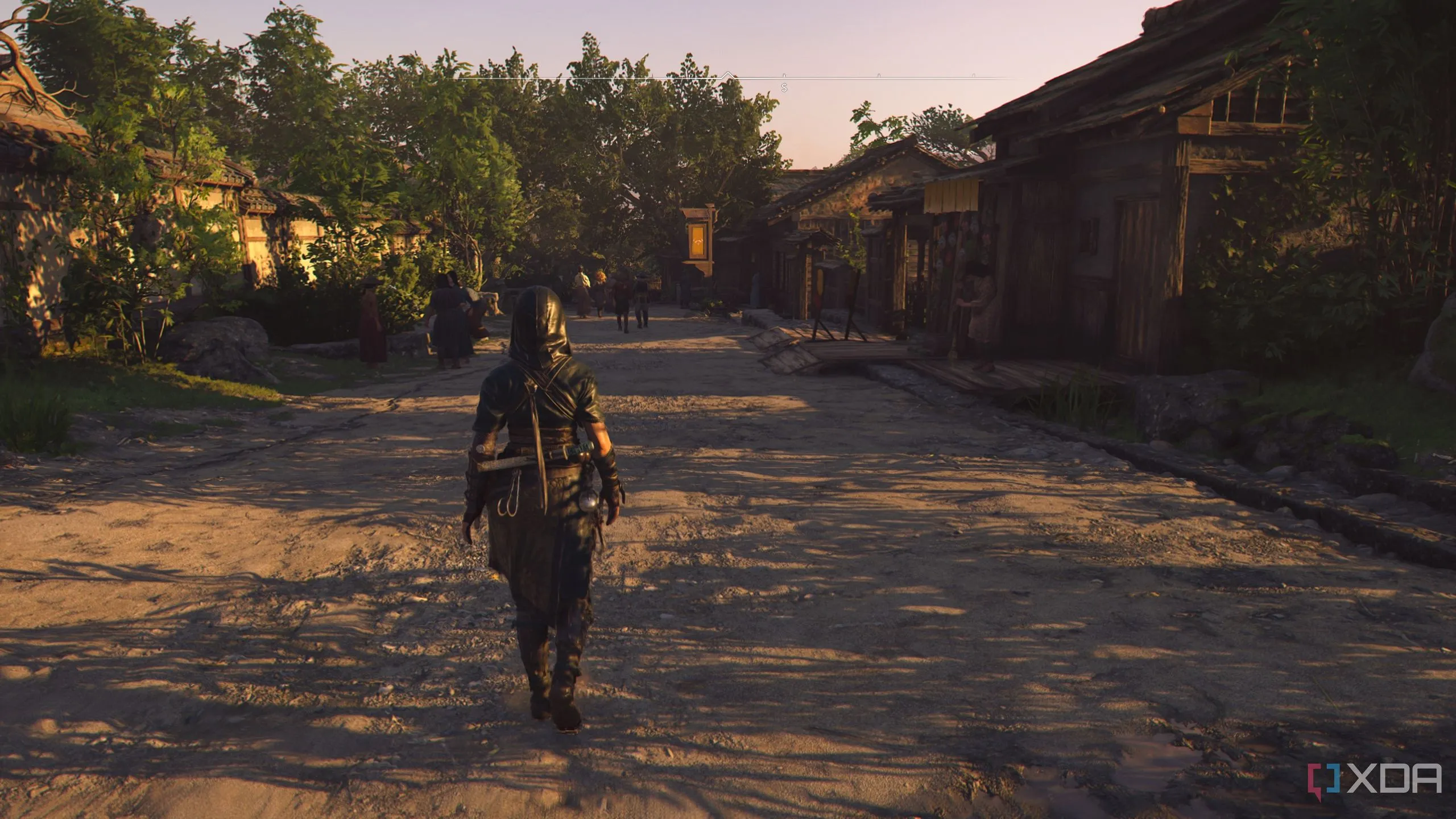 Cảnh Naoe trong Assassin's Creed Shadows bị ướt mưa, thể hiện hiệu ứng ánh sáng và vật liệu