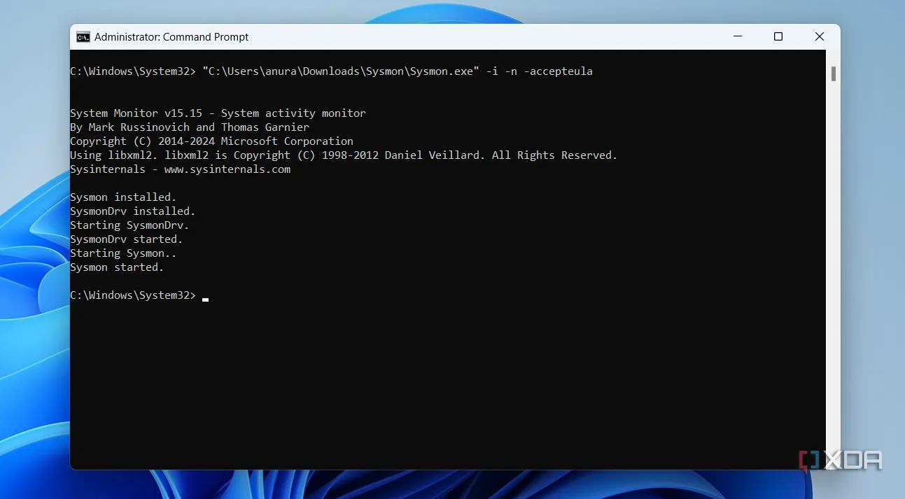 Công cụ System Monitor (Sysmon) đang được cấu hình và chạy qua dòng lệnh PowerShell.