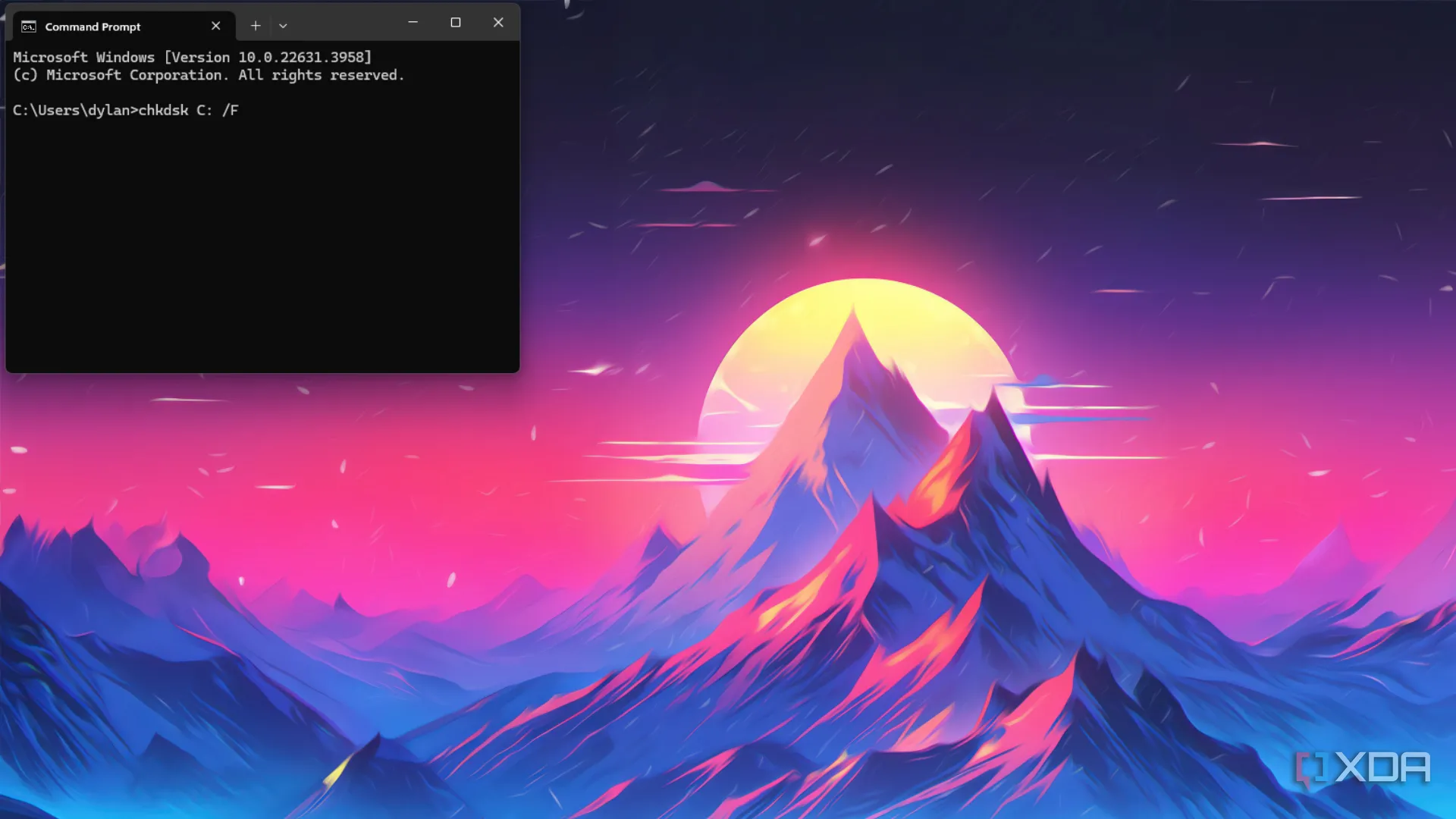 Cửa sổ lệnh Command Prompt hiển thị quá trình chạy lệnh CHKDSK để kiểm tra và sửa lỗi ổ đĩa SSD