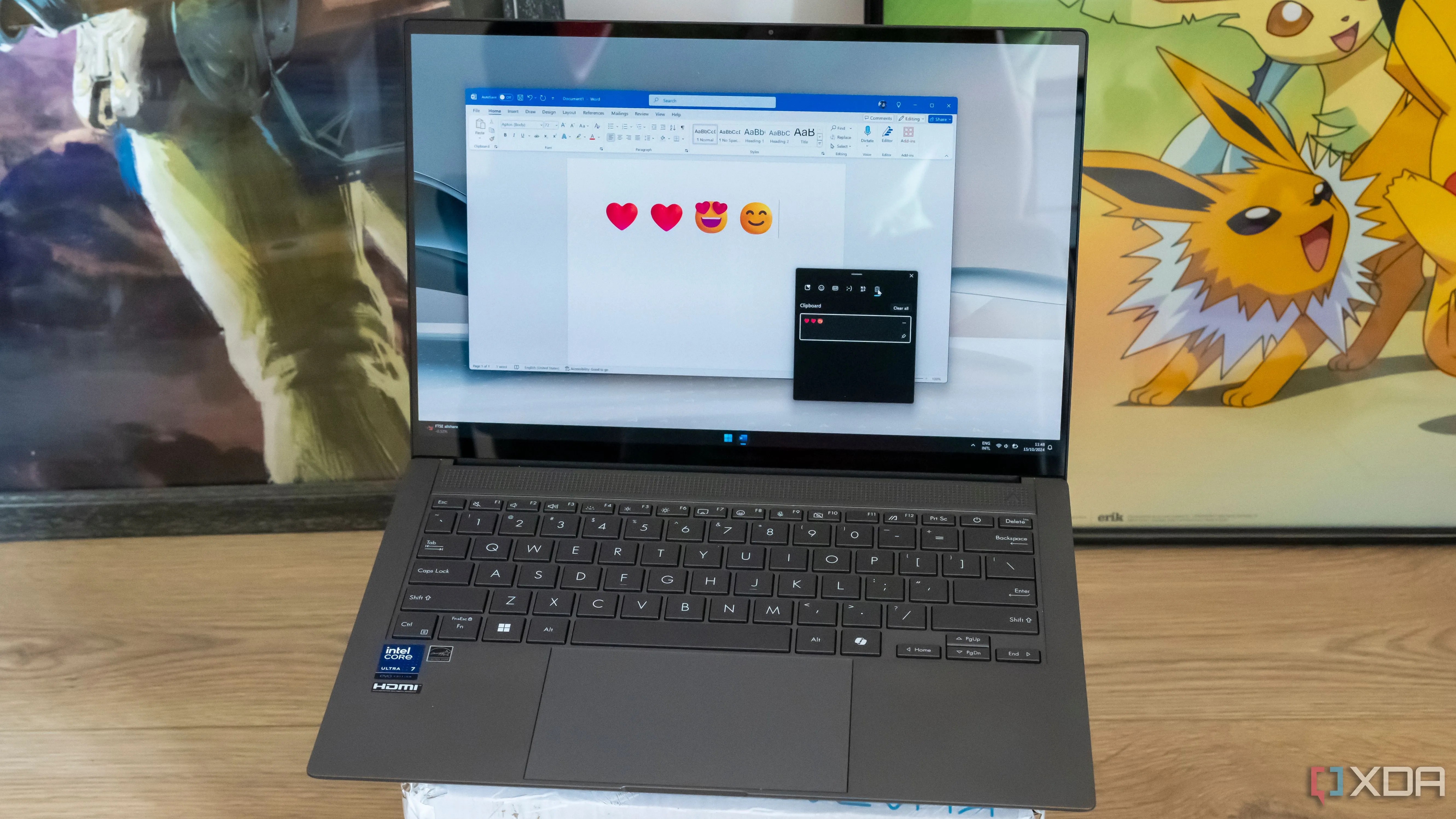 Giao diện Microsoft Word trên Windows 11 hiển thị bảng điều khiển clipboard và các biểu tượng cảm xúc, minh họa công cụ nhập liệu và chỉnh sửa tài liệu.