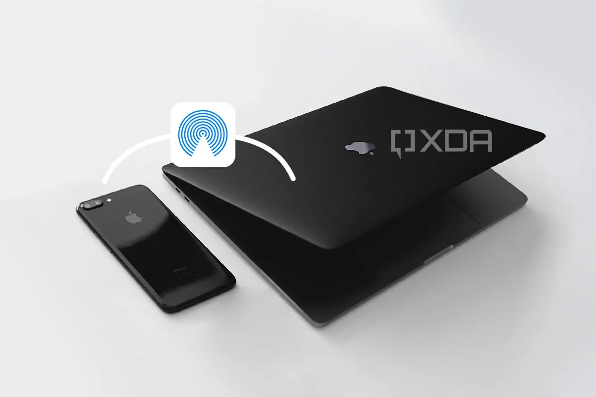 iPhone và iMac hiển thị quá trình chuyển file qua AirDrop, minh họa sự tiện lợi của hệ sinh thái Apple