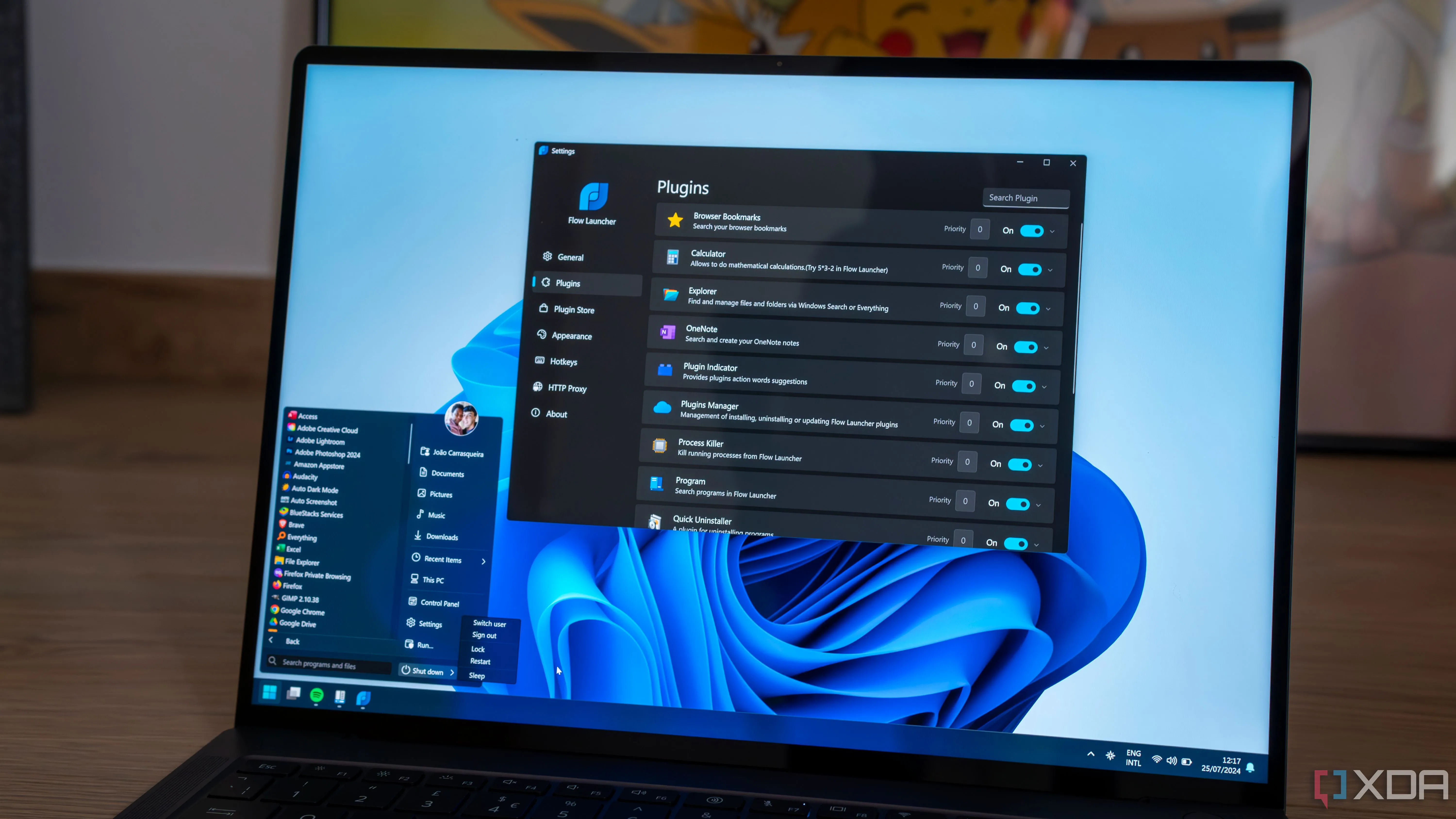 Màn hình laptop Windows 11 hiển thị các ứng dụng mặc định và tùy chọn cài đặt StartAllBack
