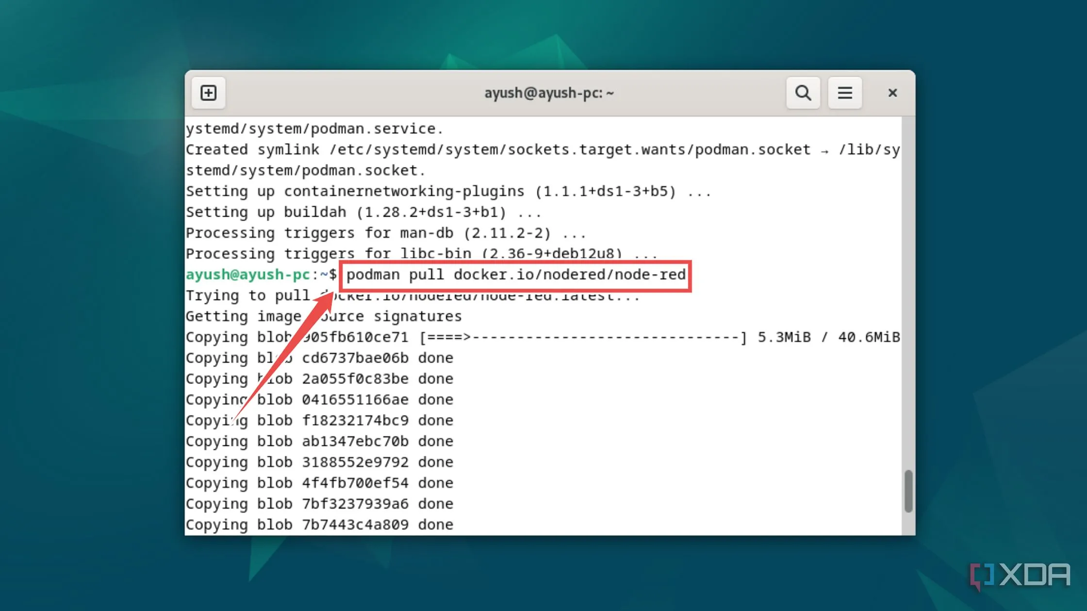 Màn hình terminal hiển thị lệnh podman pull để tải image Node-RED từ Docker Hub