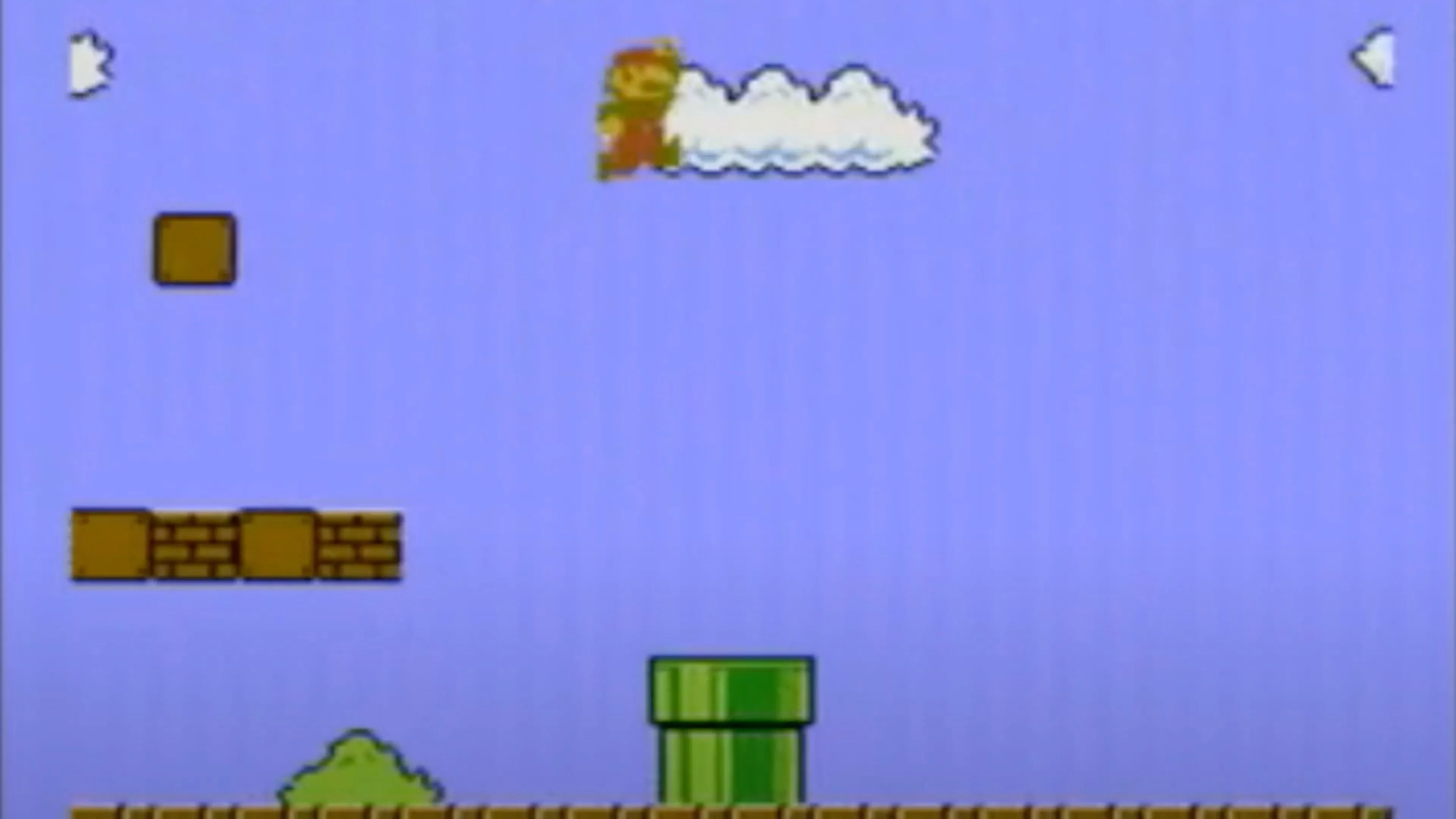 Mario đang nhảy qua chướng ngại vật trong game Super Mario Bros.