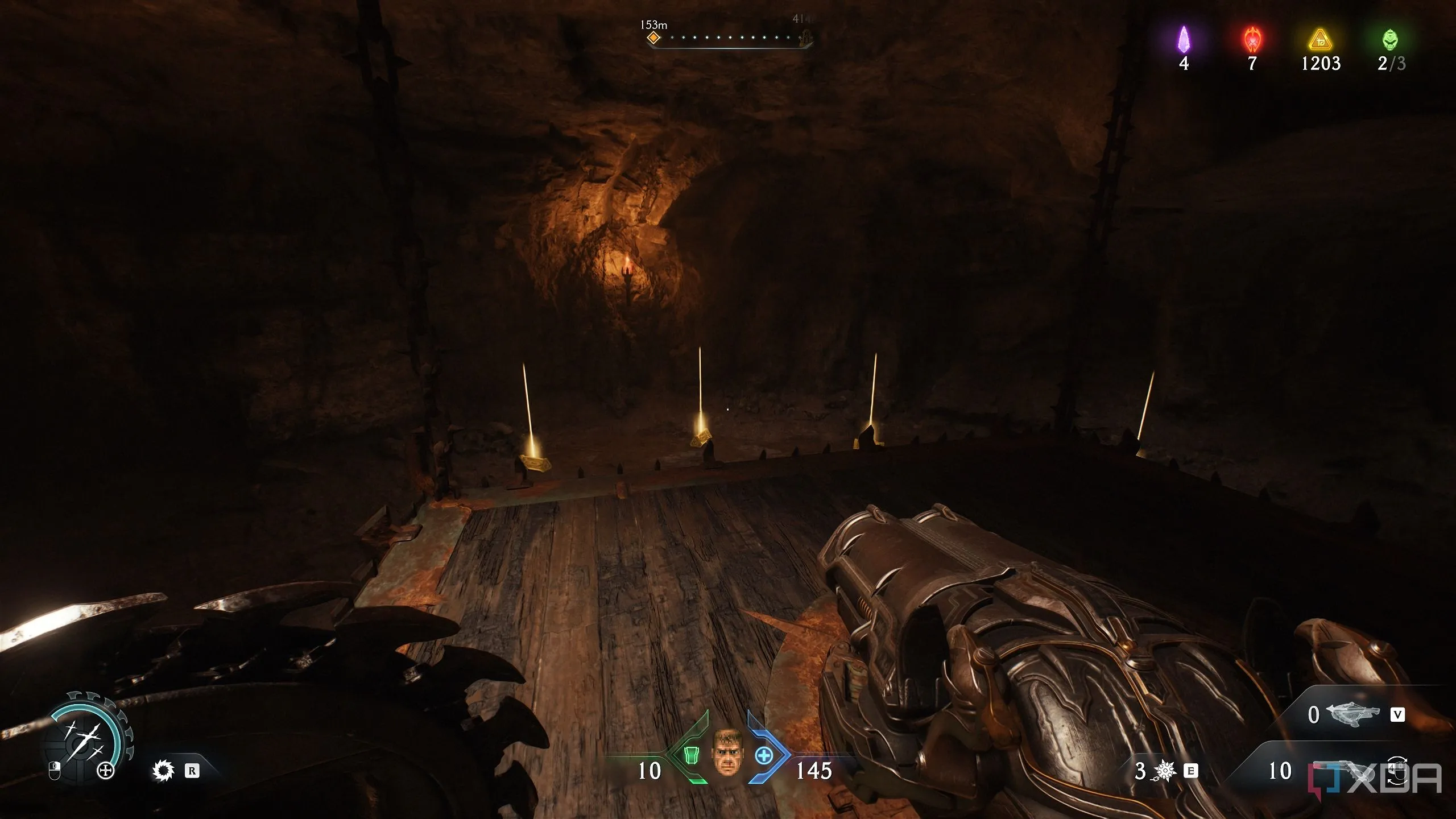 Một vệt vàng lấp lánh trên gờ đá phía trên bẫy chông đầu tiên trong Chương 20 Doom The Dark Ages.