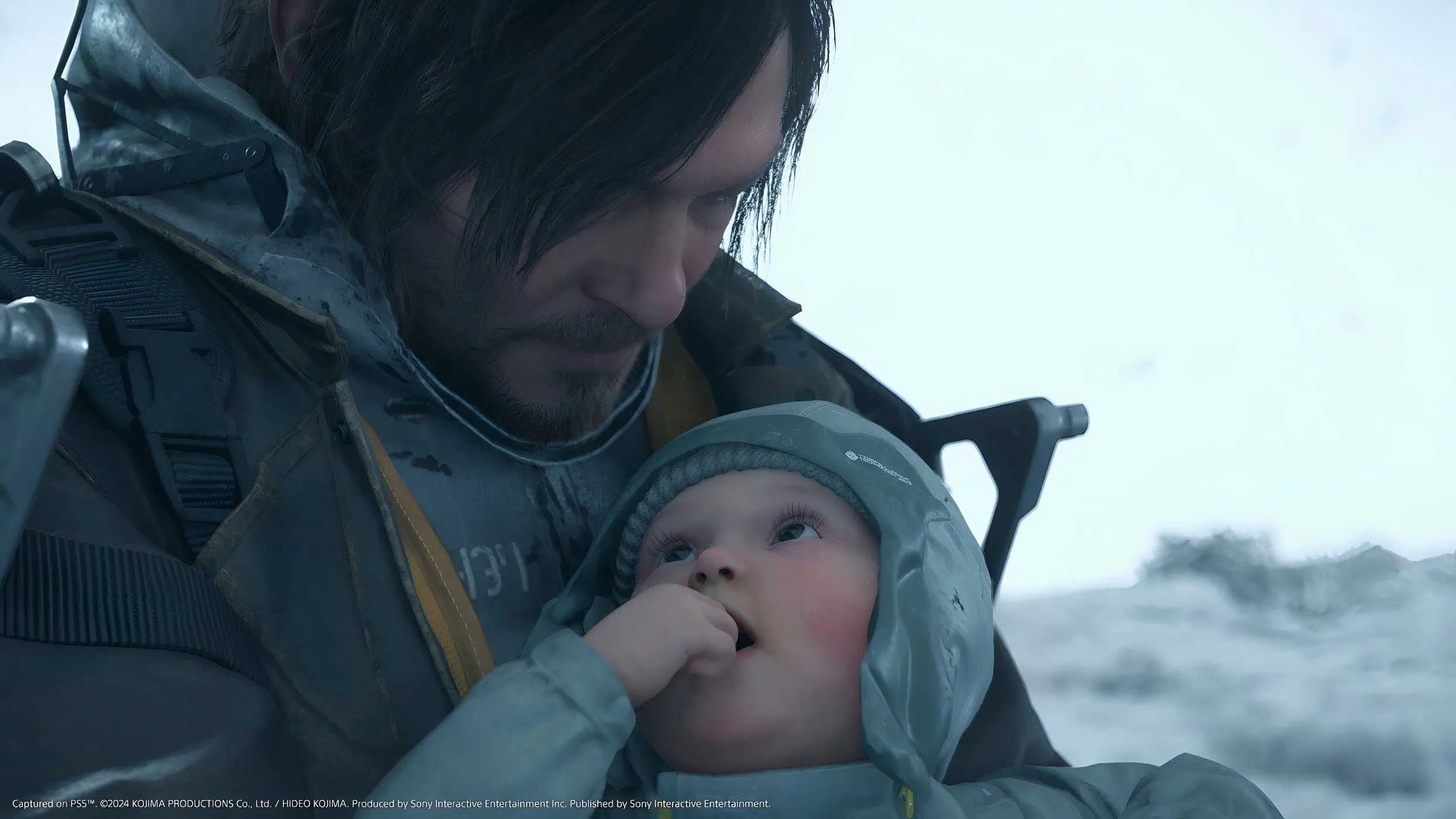Sam Porter Bridges cùng BB trong Death Stranding 2: On the Beach, tái hiện hình ảnh quen thuộc của series