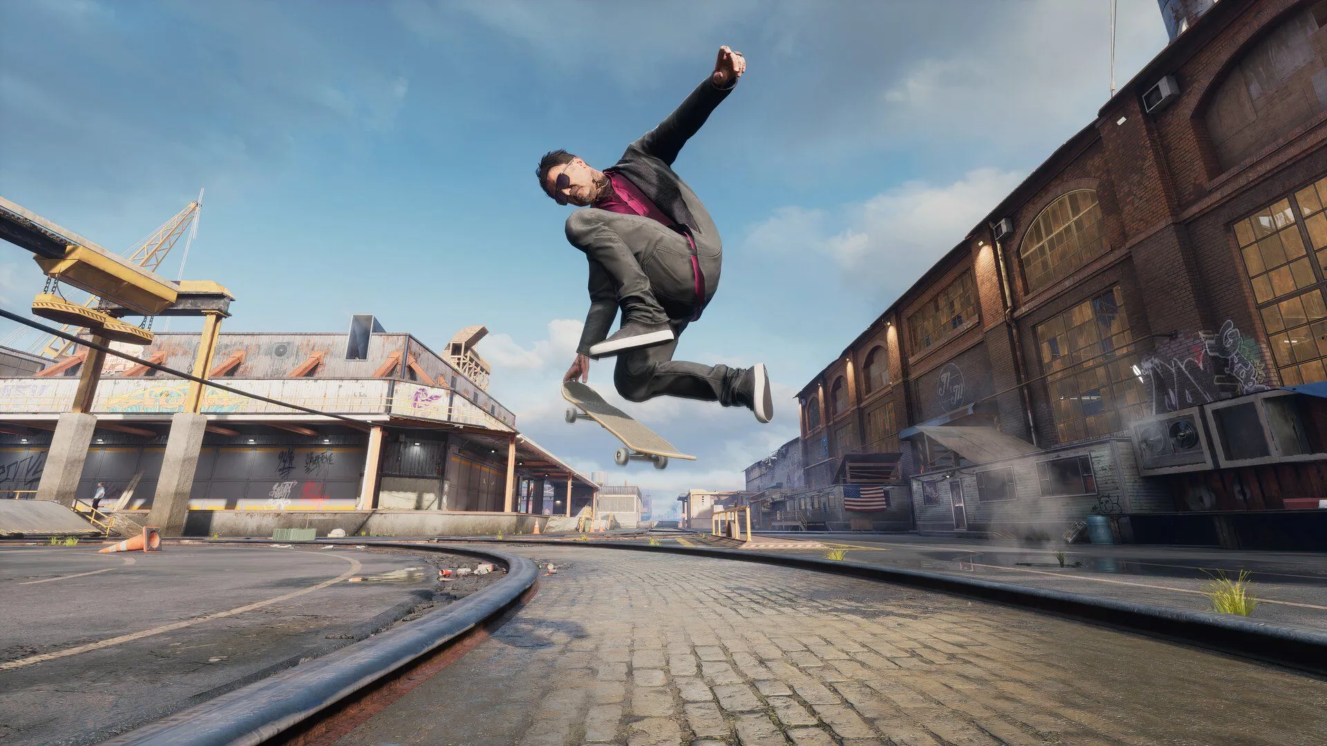 Vận động viên Tony Hawk và Bam Margera trong một cảnh chơi game Tony Hawk's Pro Skater 3 + 4, minh họa dàn nhân vật và gameplay được cập nhật.