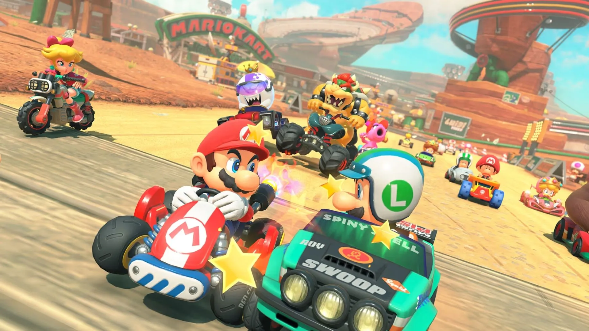 Xe kart đang vượt qua khu vực núi tuyết với đường ray tàu hỏa trong Mario Kart World, gợi nhớ Whistlestop Summit